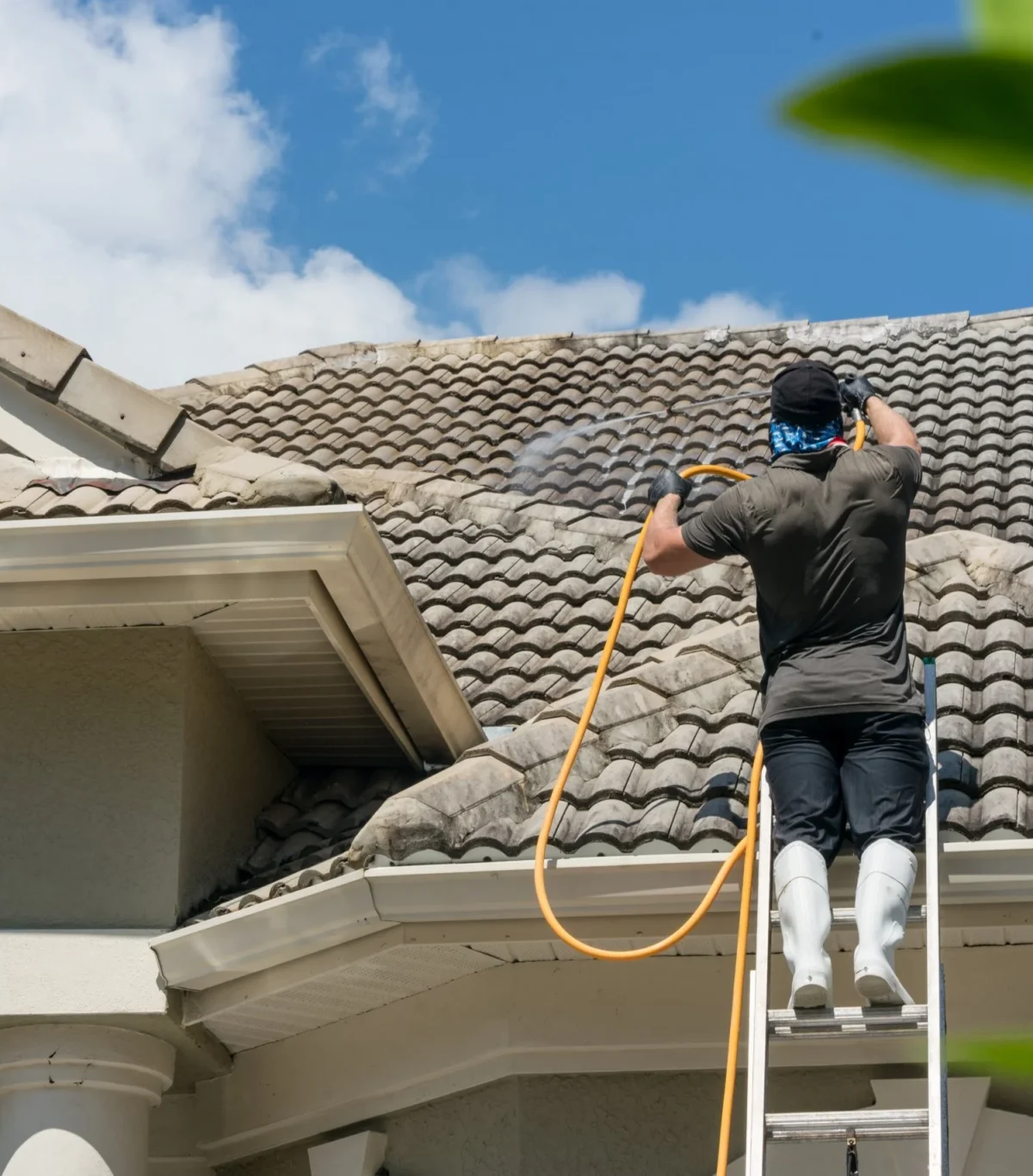 Professional pressure washing Salem Oregon home Professional pressure washing service in operation cleaning home exterior surfaces in Salem Oregon residential setting