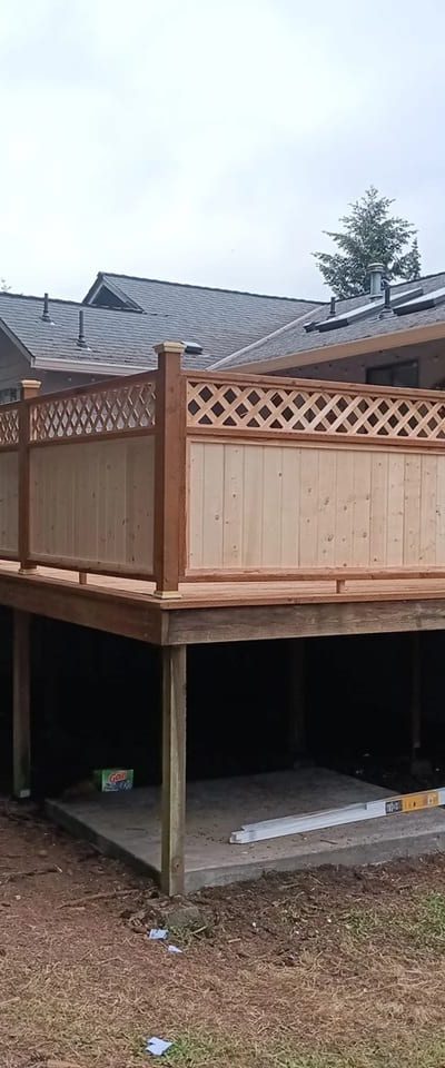 Elevated cedar deck with a lattice privacy rail, built by On Top Home Services and affiliates